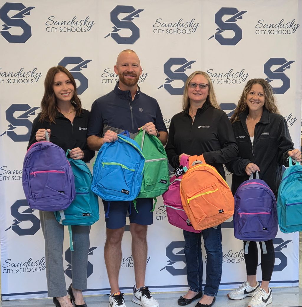 Wisehart Wright Trial Lawyers Donates Hundreds of Backpacks to Local Students